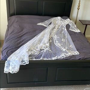 Elegant Bridal White Beaded Lace Gown with train